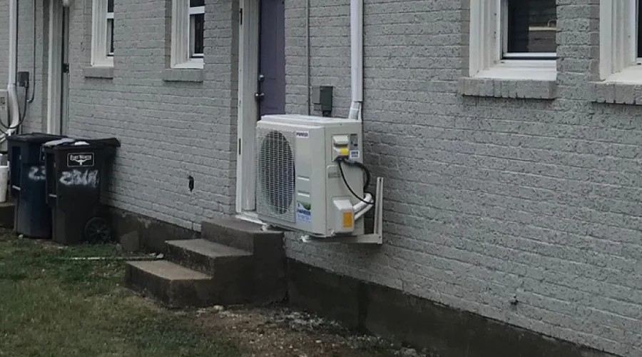 close up of a mini split air conditioner installed outside of an apartment fort worth tx